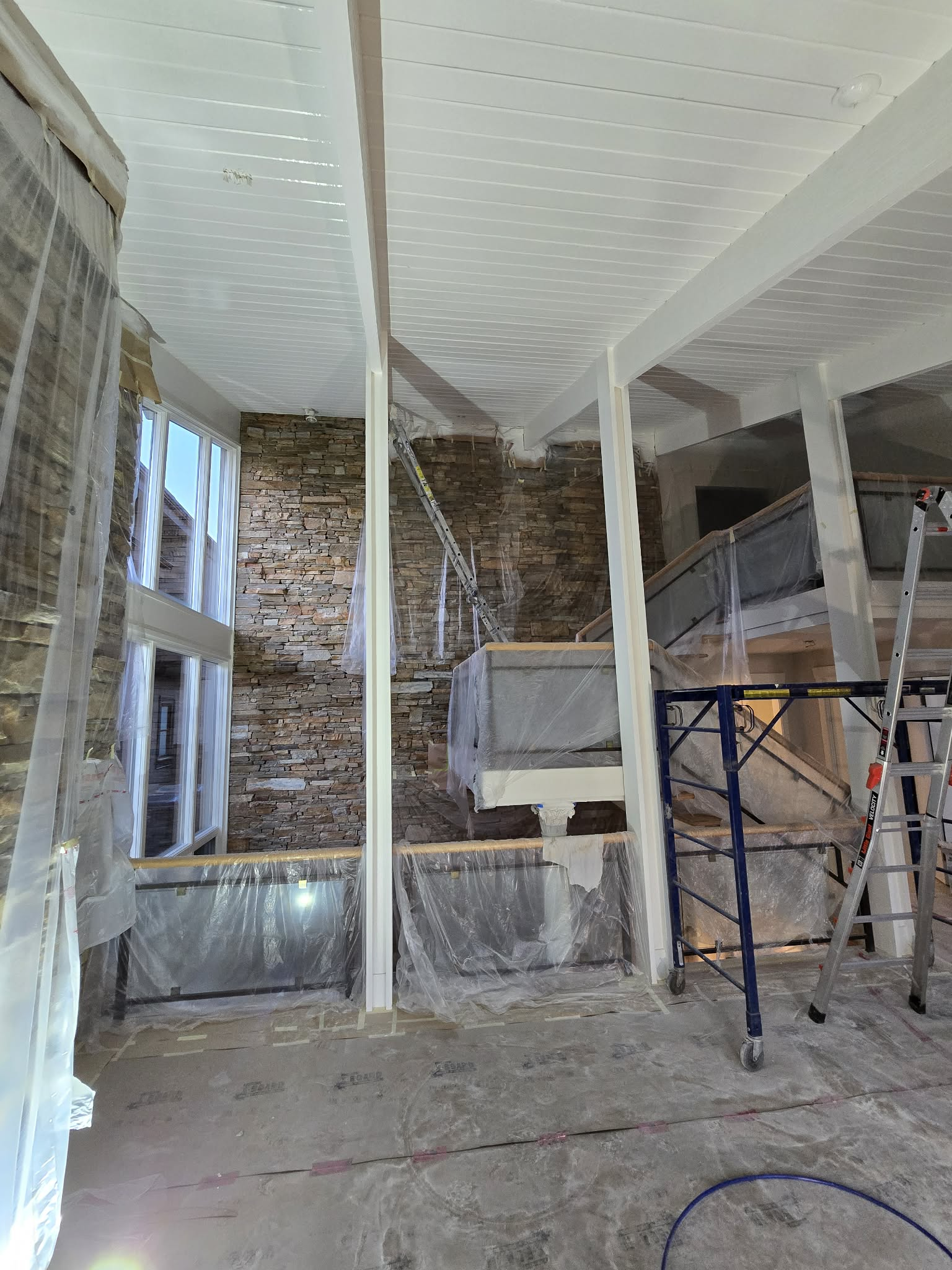 Exterior painting and finish work for an Airdrie property.