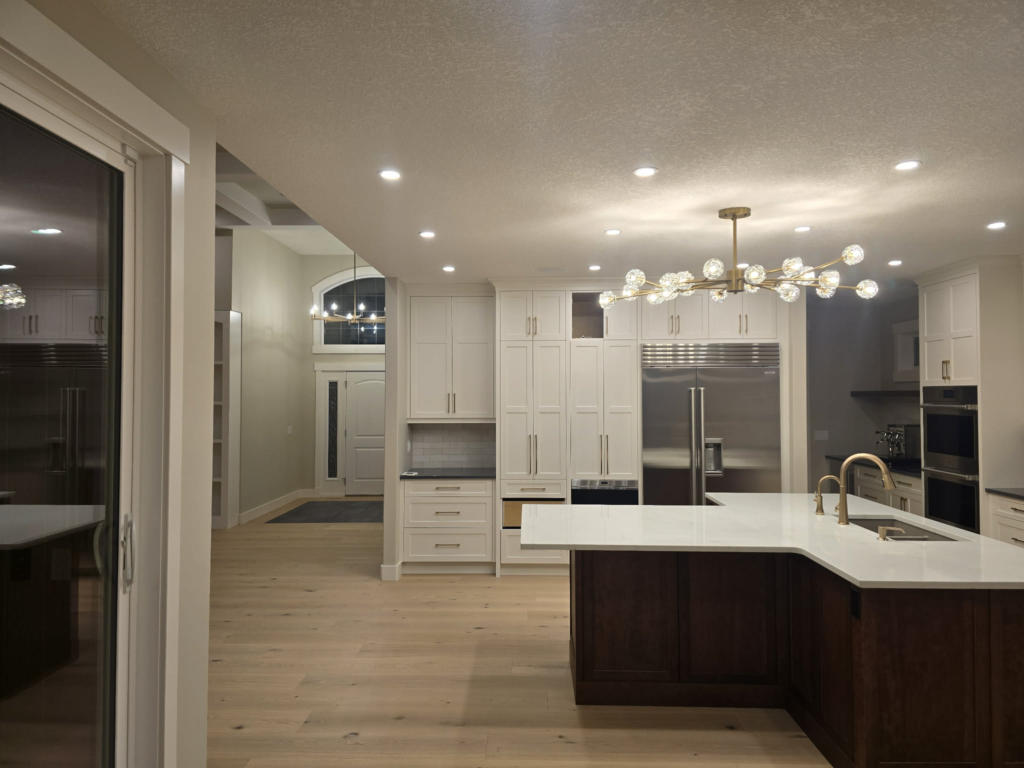 Wood cabinetry and island details in a finished kitchen