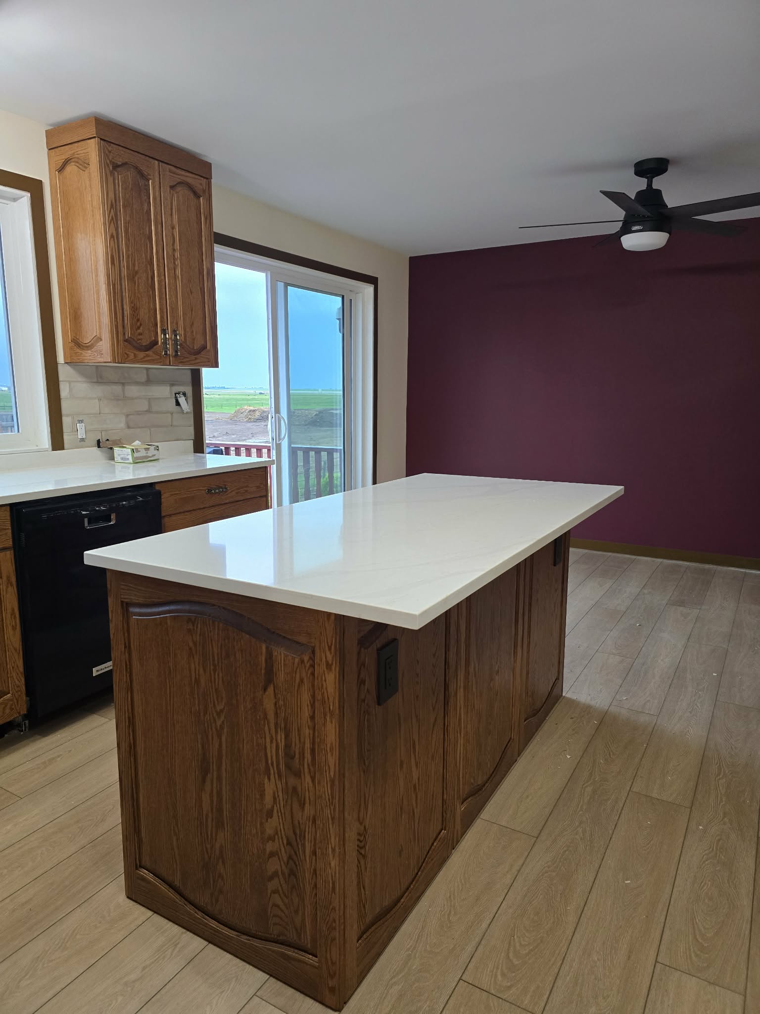 Kitchen remodel during late-stage finishing with updated flooring and countertops