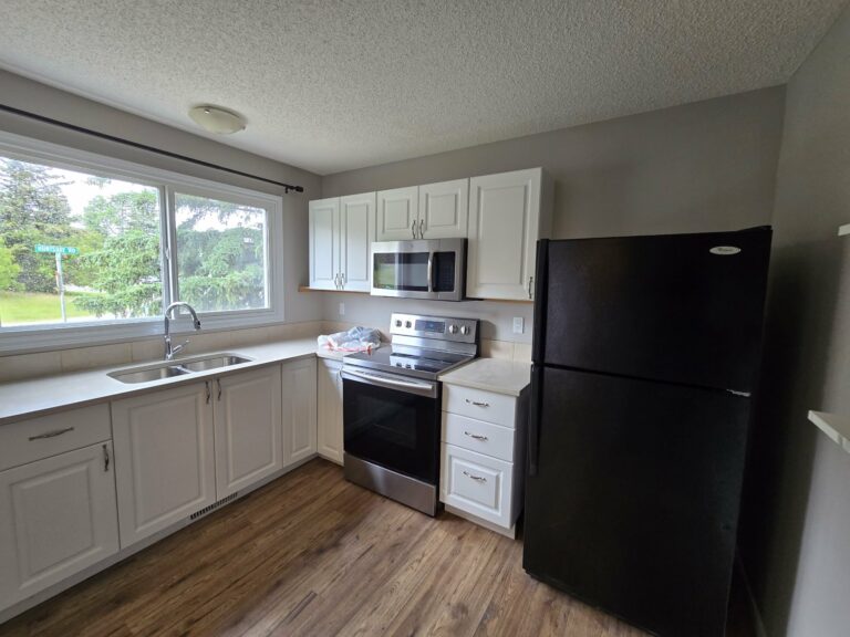 Kitchen with the replacement window and refreshed surrounding walls