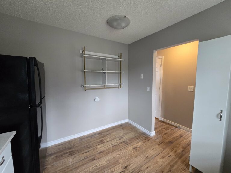 Kitchen and dining wall finish with clean white trim